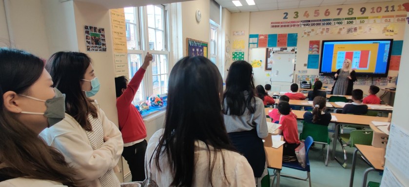 NYC London students visiting classroom